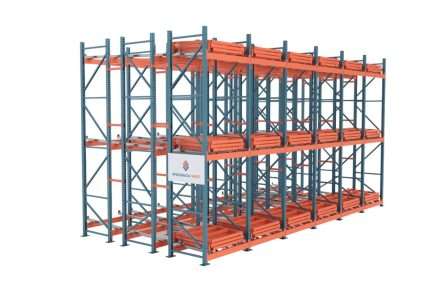 High-density pushback pallet racking system with multiple deep lanes of orange rails on blue uprights.